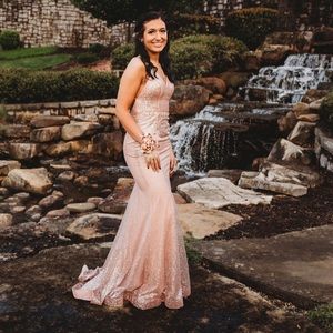 rose gold prom dress with silver sparkles.